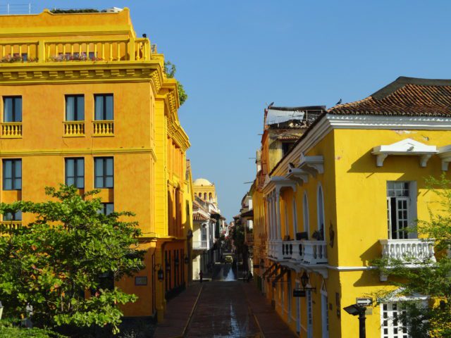 yellow building where people are preparing for their upcoming family vacations