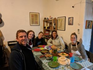 a family eating while on a family vacation to israel